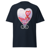 Navy blue t-shirt featuring a colorful heart design with a sunset and swirls. Annie Pigotts Portugal Passion tee