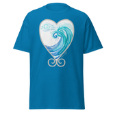 Blue t-shirt featuring a heart-shaped wave design with swirls and splashes. Annie Pigotts Portugal Wave tee