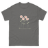 Gray t-shirt featuring a design of four pink flowers with green stems and leaves, and the text flowers make me happy. Flowers make me happy Poppy Blooms tee