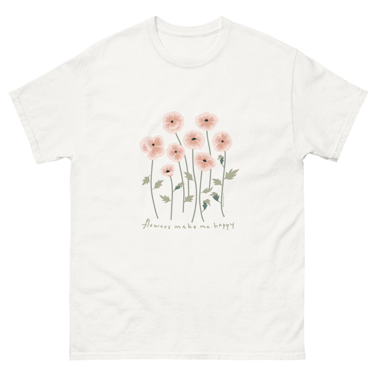 White t-shirt featuring a design of pink flowers and the phrase flowers make me happy. Flowers make me happy Poppy Meadow tee