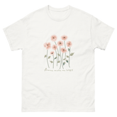 White t-shirt featuring a design of pink flowers and the phrase flowers make me happy. Flowers make me happy Poppy Meadow tee