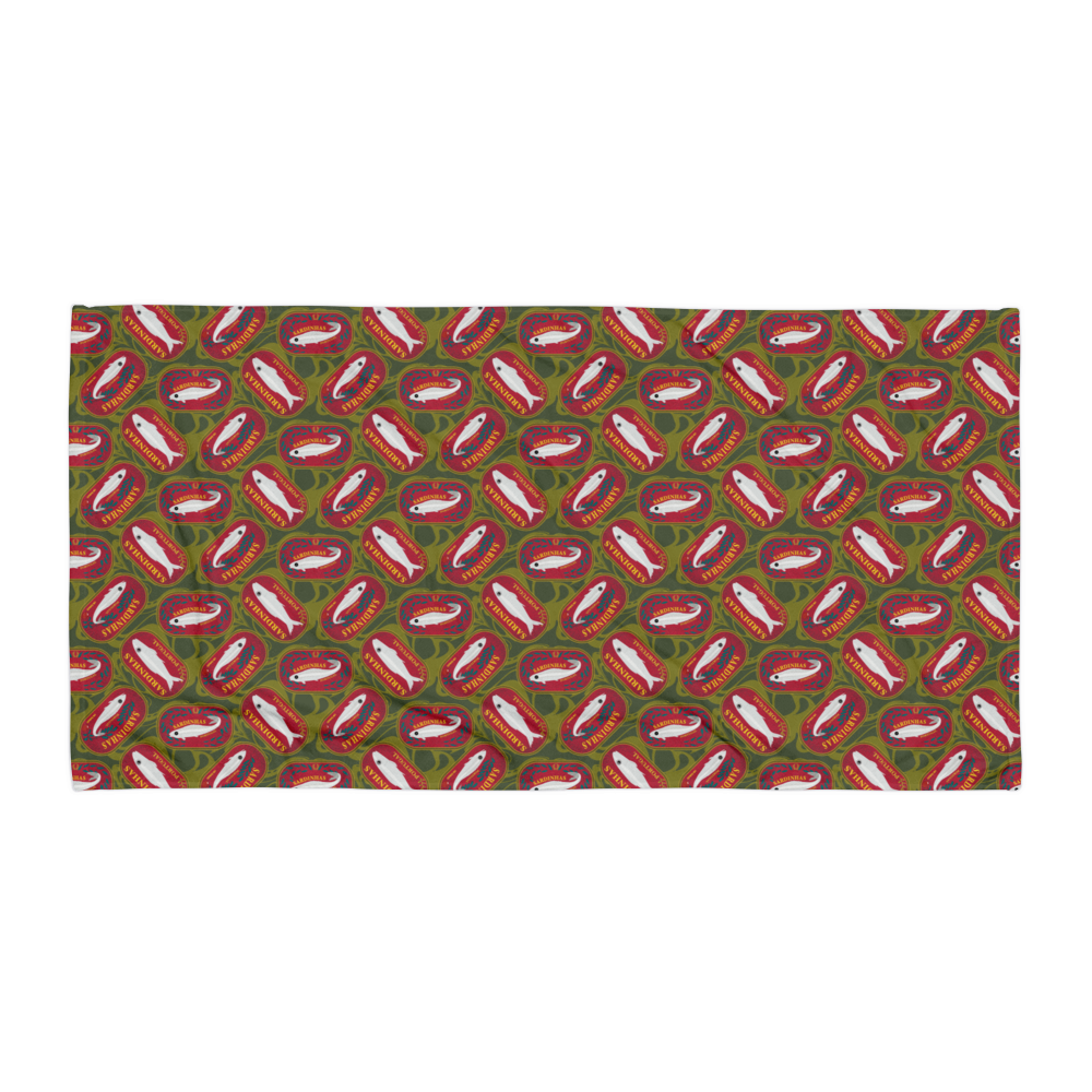 Patterned fabric featuring repeated fish illustrations on a green and red background. Sardines (Red Can) Beach Towel