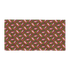 Patterned fabric featuring repeated fish illustrations on a green and red background. Sardines (Red Can) Beach Towel