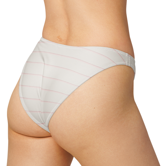 White bikini bottom with pink horizontal stripes on a model.