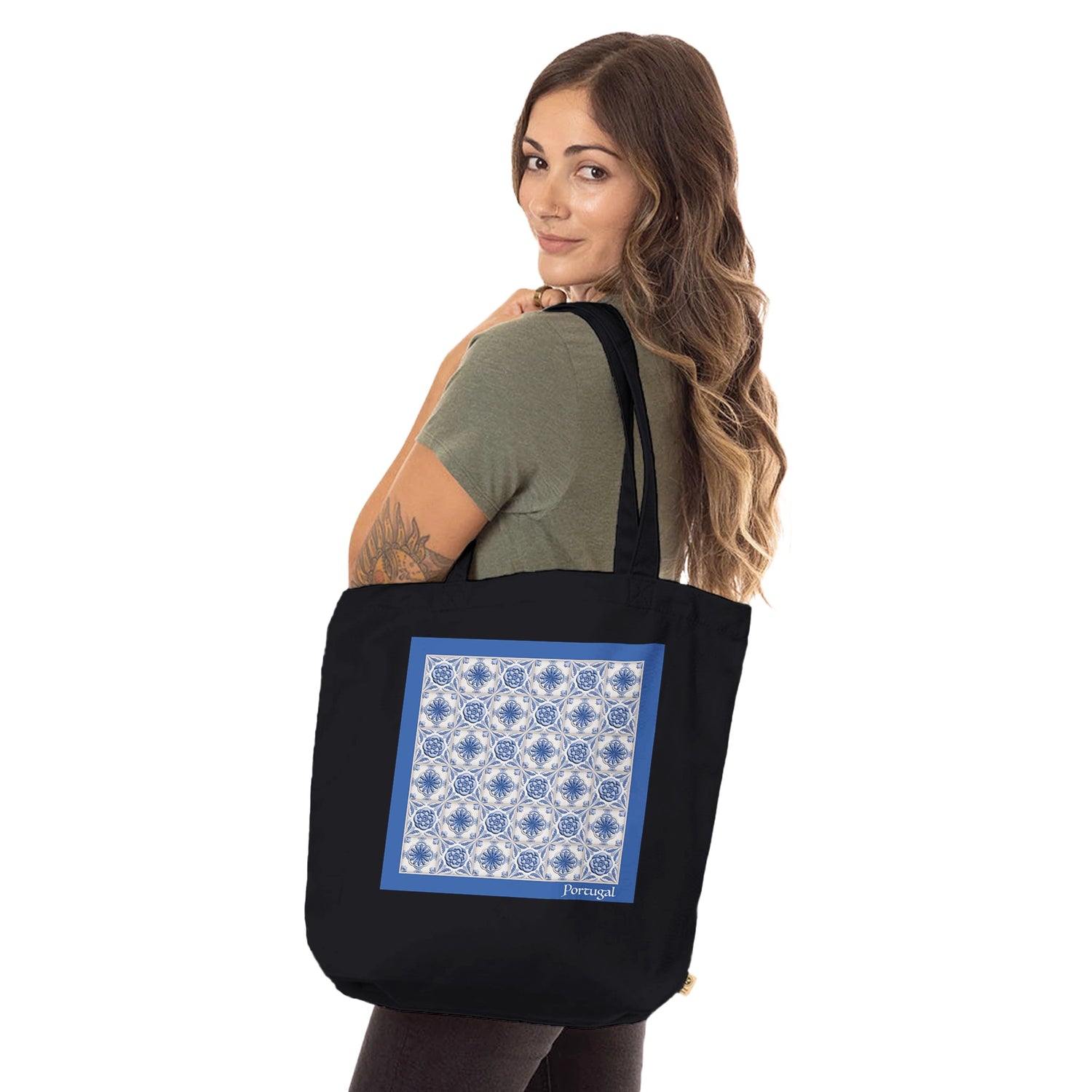 model carrying Azulejo 3D Blue Organic Tote Bag in black